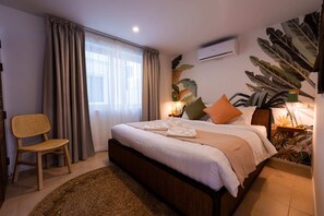 Premium bedding, memory-foam beds, in-room safe, desk