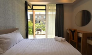 Habitació triple Deluxe | 1 dormitori, llençols de cotó egipci i roba de llit d'alta qualitat