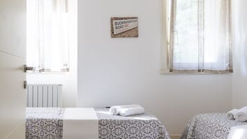 Luxury Twin Room | Down comforters, memory foam beds, soundproofing, free WiFi