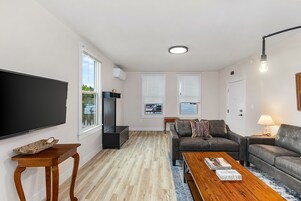 Classic Apartment | Living area | 40-inch flat-screen TV with digital channels