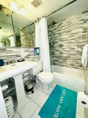 Hair dryer, towels, soap, shampoo