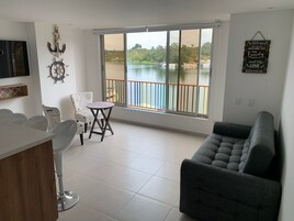 Superior Apartment, 3 Bedrooms, Lake View | Living area | 55-inch Smart TV with digital channels