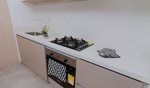 Appartamento | Cucina privata | Frigorifero, microonde, macchina per tè/caffè