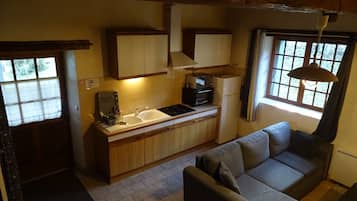 Signature House | Living area | 80-cm flat-screen TV with digital channels