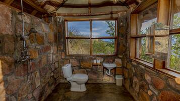 Standaard cottage | Badkamer | Een douche, handdoeken