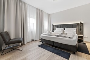 Standaard appartement | 2 slaapkamers, luxe beddengoed, een bureau, verduisterende gordijnen
