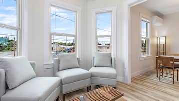 Classic Apartment | Living area | 40-inch flat-screen TV with digital channels