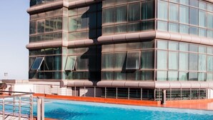 A modern building with a rooftop pool area. - Fairview Luxury Apartments (Dar es Salaam)