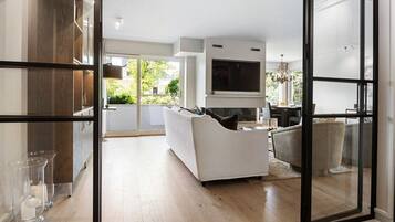 Luxury Apartment, 2 Bedrooms, Balcony | Living area | Fireplace, heated floors