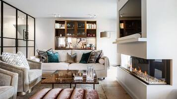 Luxury Apartment, 2 Bedrooms, Balcony | Living area | Fireplace, heated floors