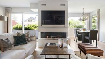 Luxury Apartment, 2 Bedrooms, Balcony | Living area | Fireplace, heated floors