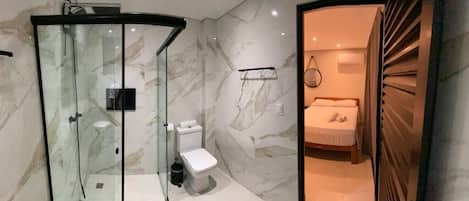 Shower, hair dryer, towels, soap