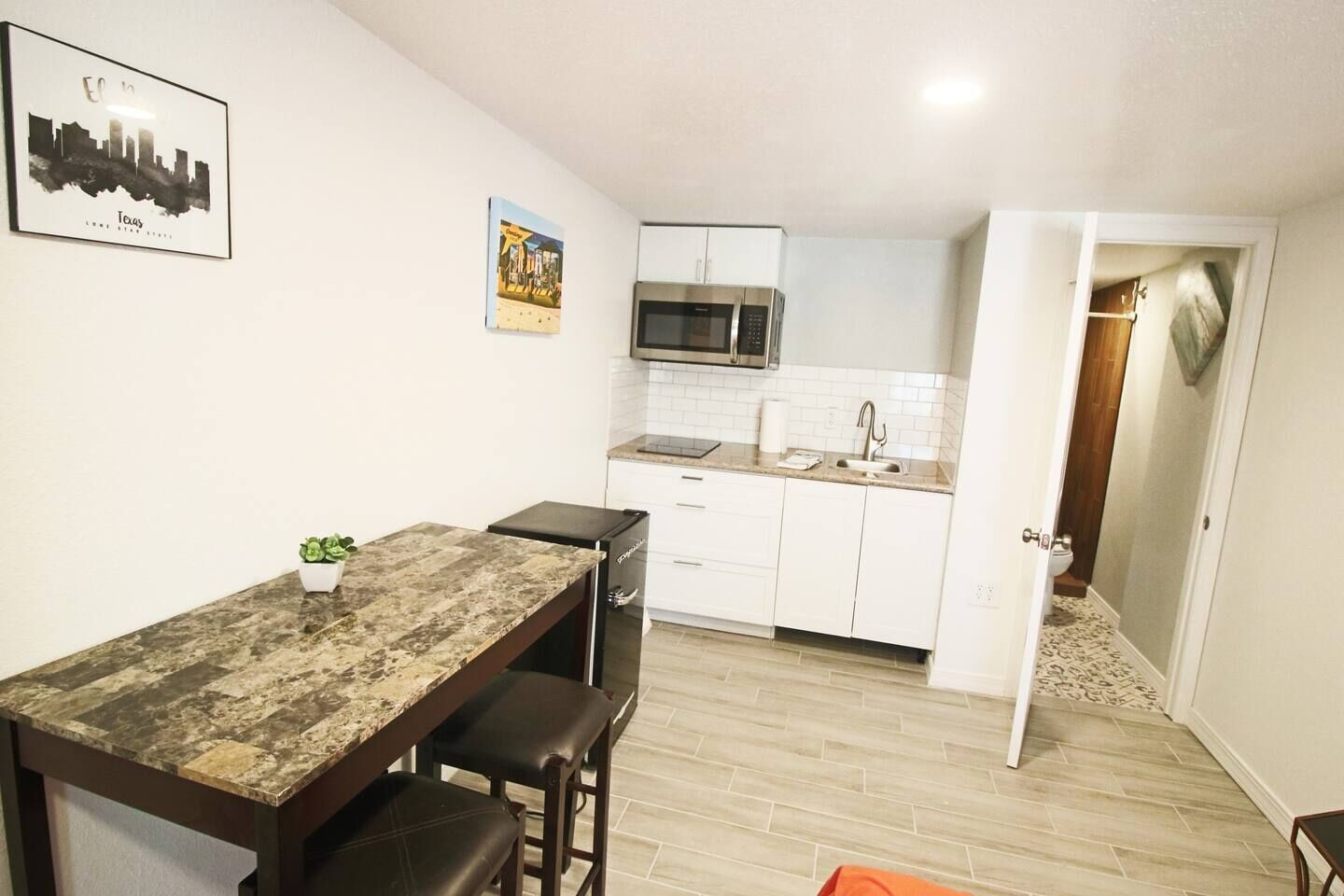 Fridge, microwave, stovetop, coffee/tea maker