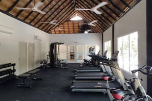 Work out in style with treadmills and weight equipment at this well-lit gym.