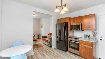 Classic Apartment | Private kitchen | Fridge, microwave, oven, stovetop