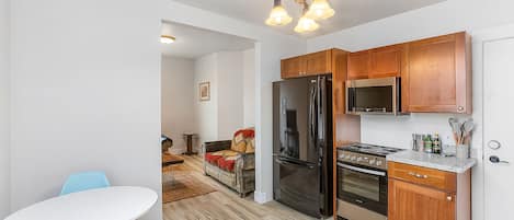 Classic Apartment | Private kitchen | Fridge, microwave, oven, stovetop