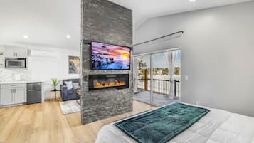 1 bedroom, desk, iron/ironing board, travel crib