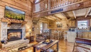 Een televisie, een open haard en tafelvoetbal