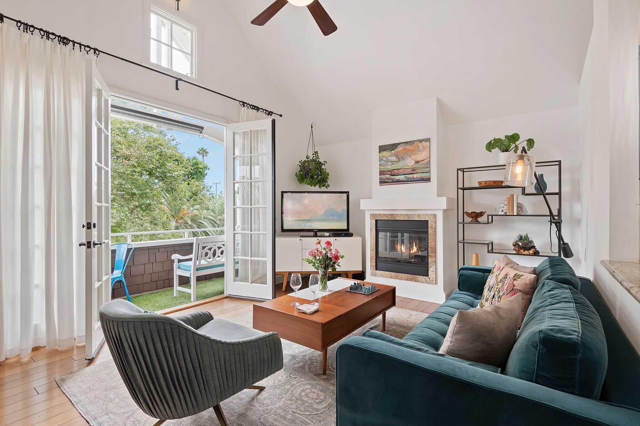 TV, fireplace, books, stereo