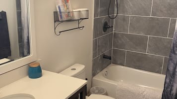 Hair dryer, towels, soap, shampoo