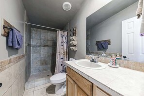 Shower, hair dryer, towels