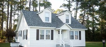 Mid-century modern meets classic cape on the coast.