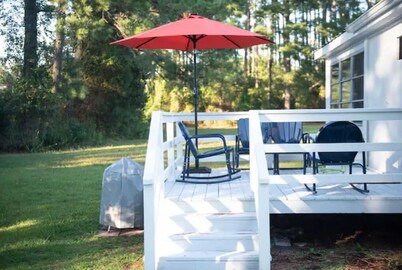 Mid-century modern meets classic cape on the coast. 
