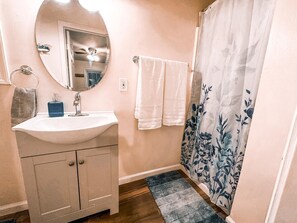 Hair dryer, towels, soap, shampoo