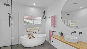 Bathtub, hair dryer, towels