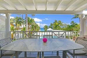 Outdoor dining - Ocean View 2 BR & Pool - Coconut Bay Villas #116 (West Bay)