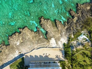 On the beach - Coconut Bay Villas #122  West Bay 3 BR Oceanfront (West Bay)