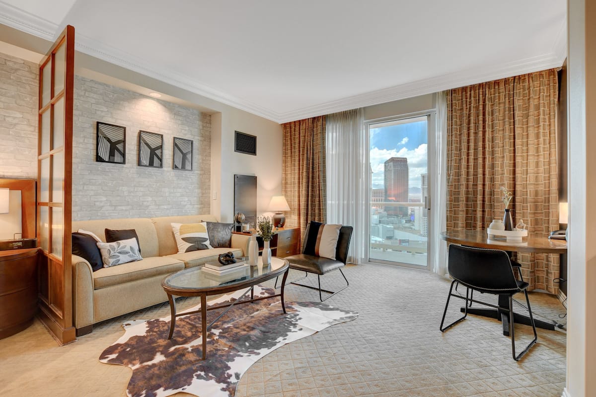 Premium Studio Suite | Living area | 40-inch flat-screen TV with cable channels