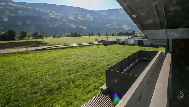 A modern building with a flat roof and a large open space in front. - Der Pinsler by Interhome (Fügen)