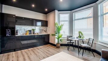 Superior Suite, 1 Double Bed, Kitchen, Partial Ocean View | Private kitchen | Fridge, microwave, oven, stovetop