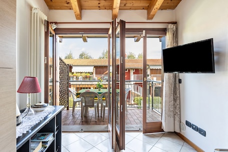 Interior. Apartment 'Residence La Corte' with Shared Pool, Balcony, and Air Conditioning