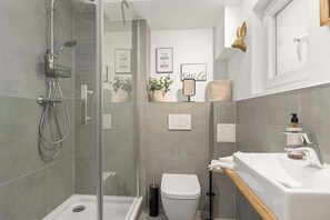 Shower, hair dryer, shampoo