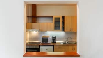 Estúdio premium | Cozinha privada | Geladeira, micro-ondas, fogão, cooktop