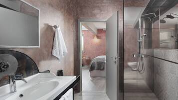 Shower, rainfall showerhead, hair dryer, towels
