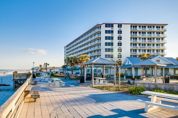 Property grounds - Beachfront Escape you need, Relax in the adorable condo overlooking the ocean and pool. With a cute kitchenette, relaxing living area, smart TVs, and thoughtful touches throughout, it’s the perfect blend of comfort and relaxation. (Daytona Beach)