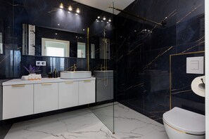 Shower, free toiletries, towels, soap