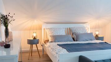 1 bedroom, desk, iron/ironing board, travel crib