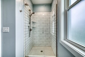 Bathtub, hair dryer, towels