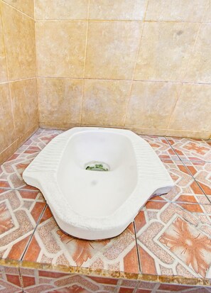 Habitación estándar doble | Baño | Ducha y jabón