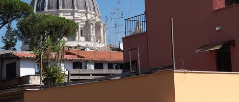 A building with a dome and antenna.