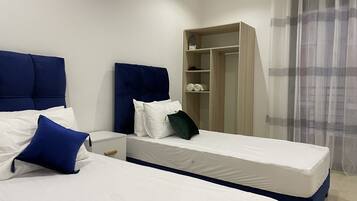 2 quartos, ferros/tĂĄbuas de passar roupa, Wi-Fi, roupa de cama