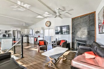Facing out of main living room into kitchen area
