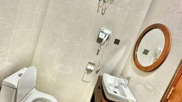 Hair dryer, towels, soap, toilet paper