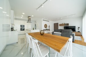 Executive Three-Bedroom Penthouse with Sea view & Jacuzzi | Private kitchen | Full-size fridge, microwave, oven, stovetop