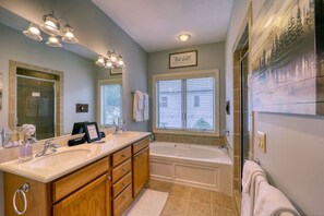 Shower, jetted tub, hair dryer, towels