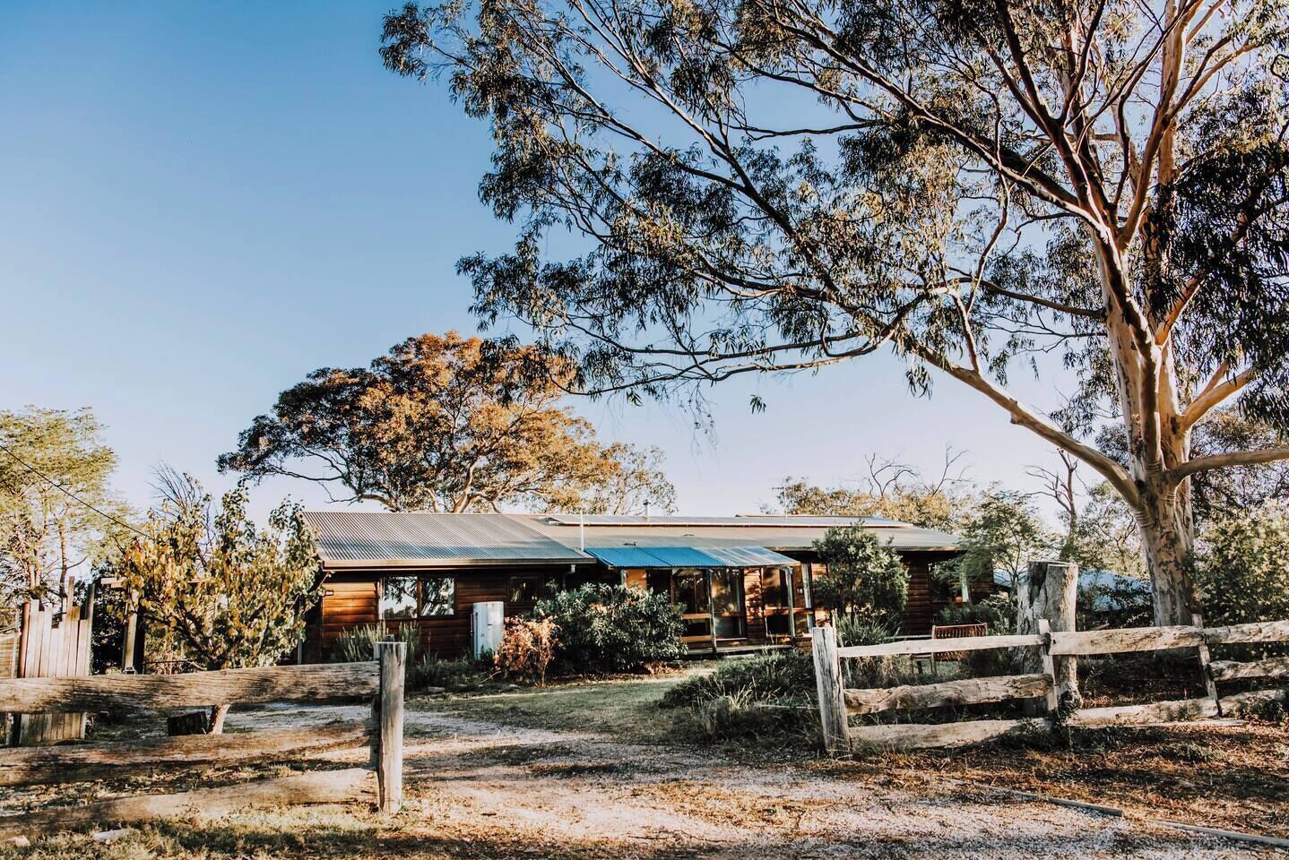 Ilkley House is the largest cottage at Budgee Budgee Farm with five bedrooms, backyard amenities, and Mudgee valley views
